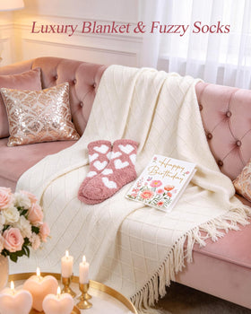 Coralogo pink ceramic mug with candle lit creating a relaxing tea moment