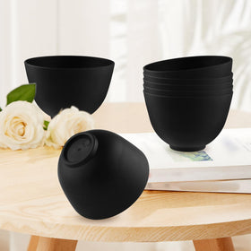 Cositina bowl held in hand demonstrating 10x6.8cm size and portability