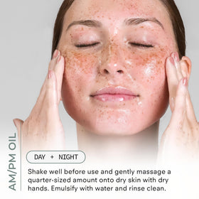 COSMEDIX cleansing oil being massaged onto cheek to lift makeup and impurities effectively