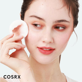COSRX placed on bathroom shelf as part of a calming skincare routine