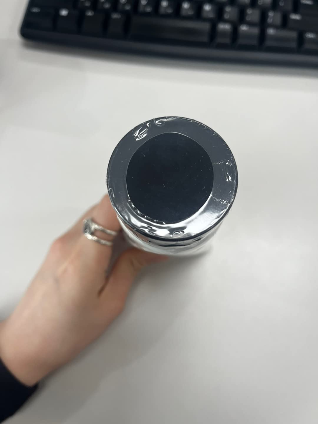 COSRX bottle beside a ruler for scale to show the 150ml size benefit