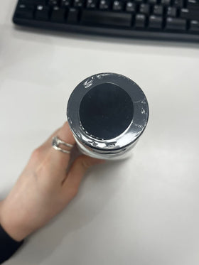 COSRX bottle beside a ruler for scale to show the 150ml size benefit