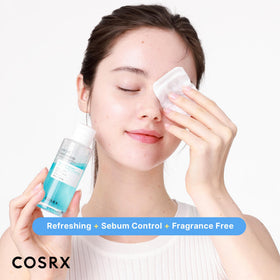 COSRX bottle held in hand for size comparison and travel-friendly use
