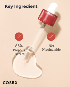 COSRX serum drop on skin in hand illustrating quick absorption benefit