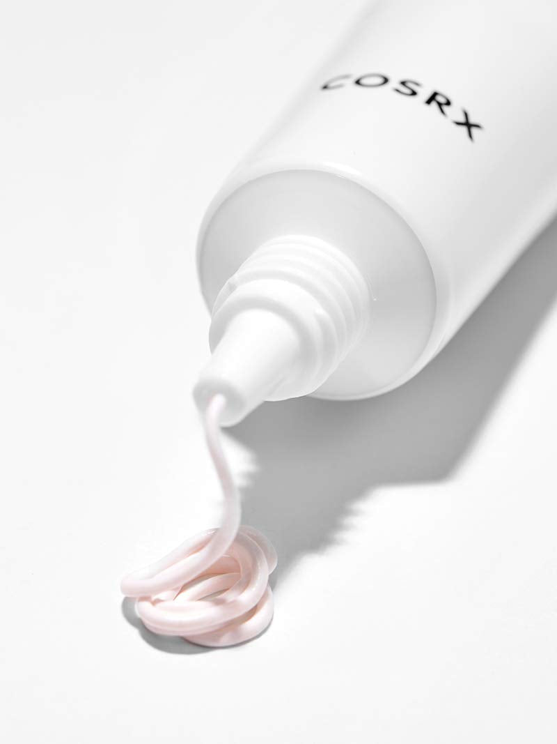 COSRX next to coin to show 30g jar size and travel-friendly portability