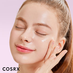 COSRX clear serum drop close-up showing lightweight texture and quick absorbency benefit