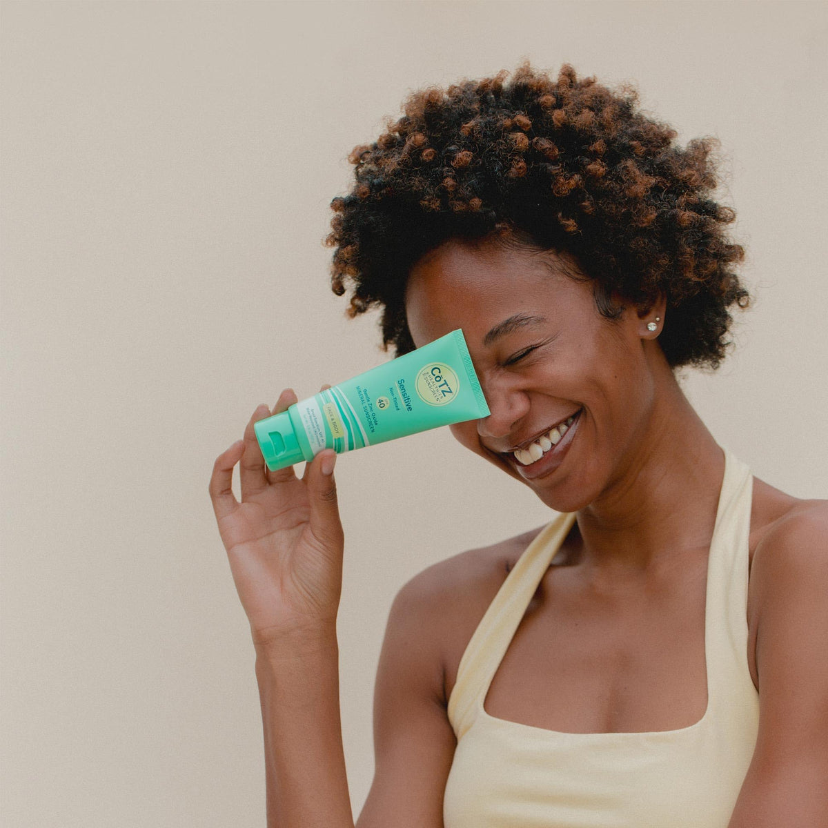 CoTZ product label close-up showing zinc oxide active ingredient and benefits