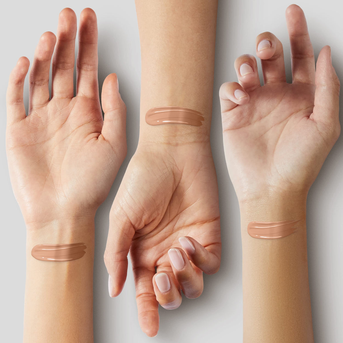 COVERGIRL & Olay 245 Warm Beige swatch on wrist showing true warm undertone