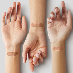 COVERGIRL & Olay 245 Warm Beige swatch on wrist showing true warm undertone