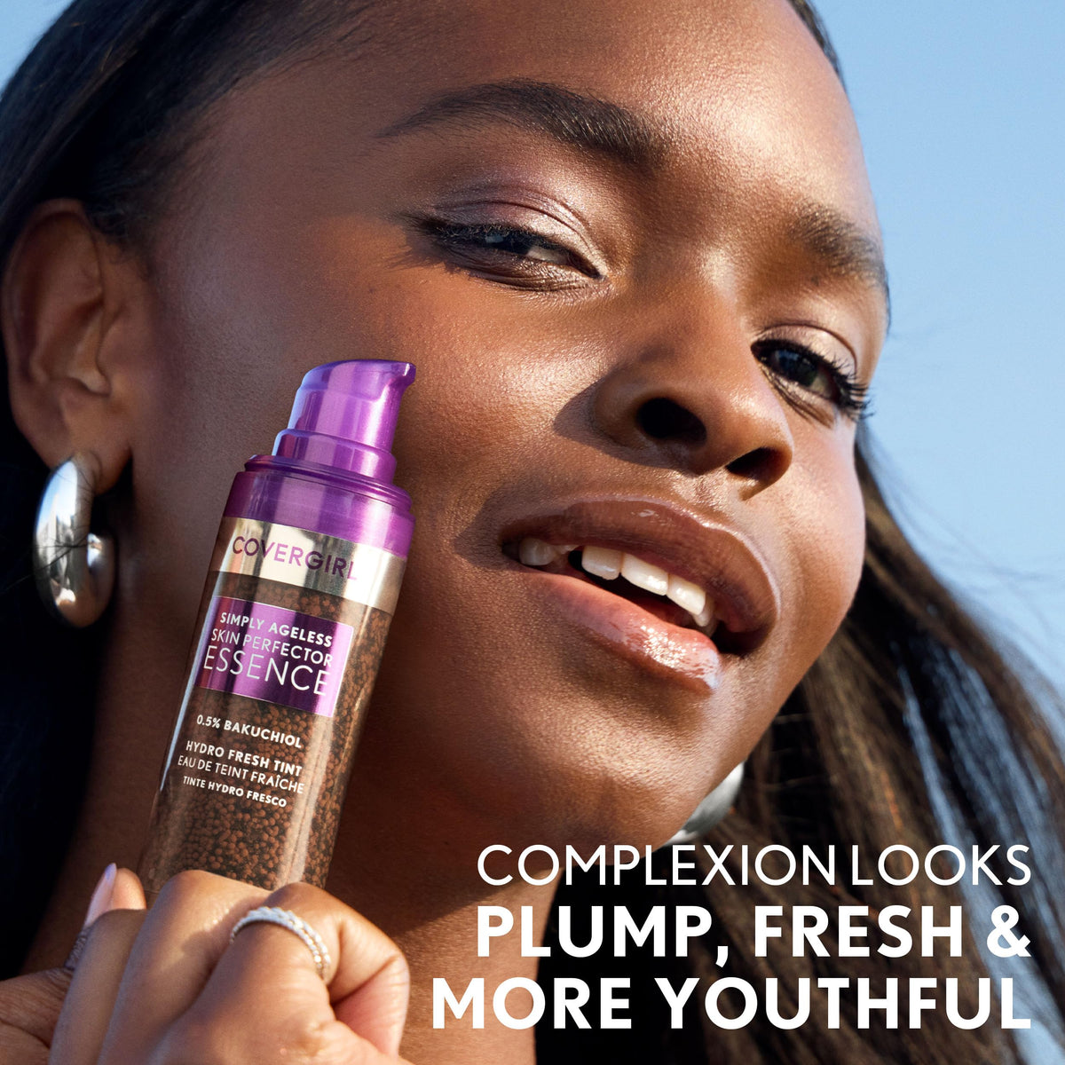 COVERGIRL application across cheek demonstrating sheer coverage and dewy skin effect