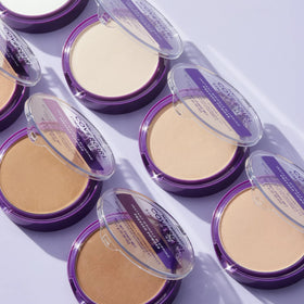 COVERGIRL compact in a handbag for on-the-go mattifying touch-ups benefit