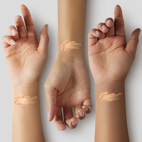 COVERGIRL powder in hand to show size and portability for touch-ups