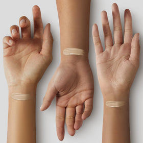 COVERGIRL applying foundation with a brush for even, streak-free coverage