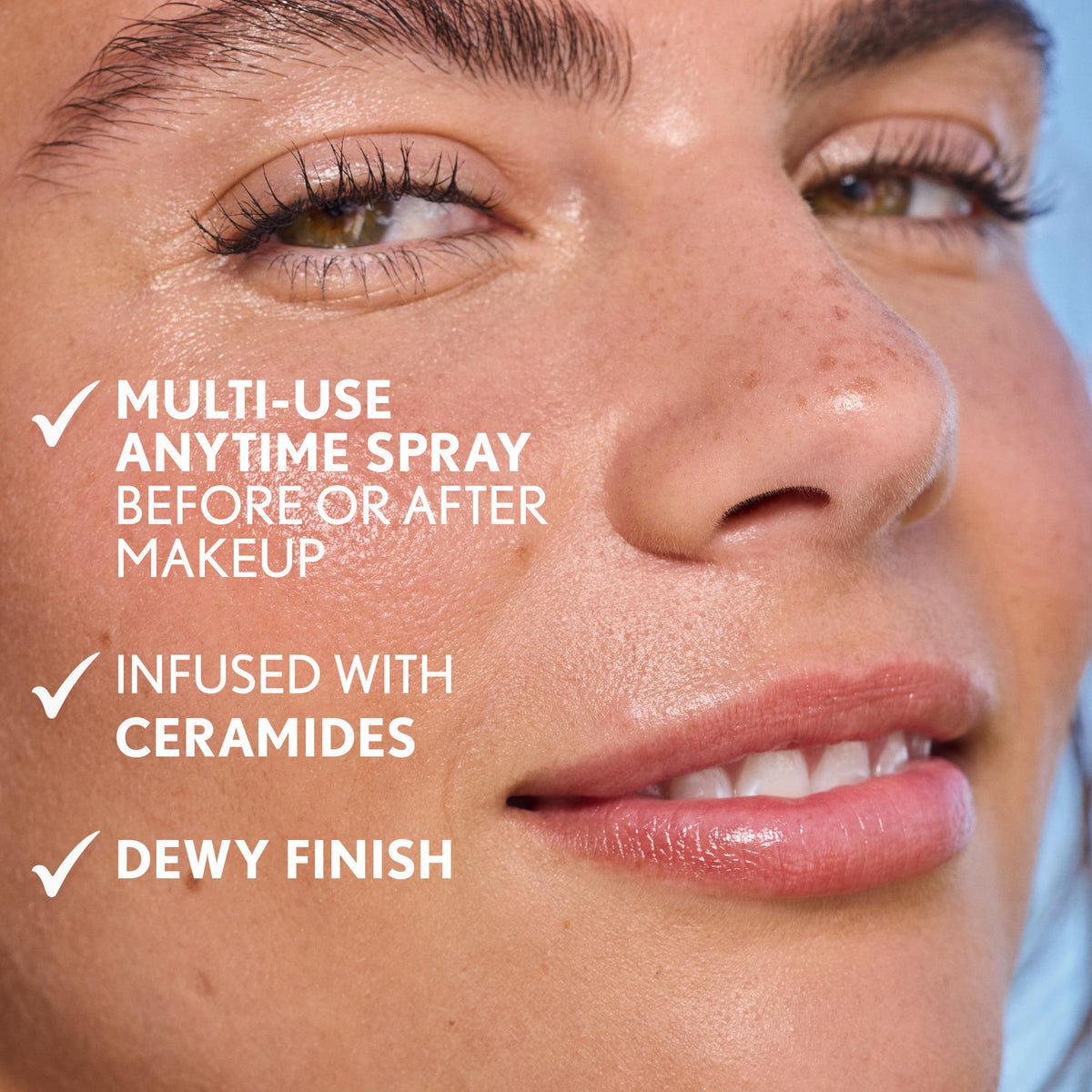COVERGIRL model spritzing face to show refreshing, dewy finish benefit
