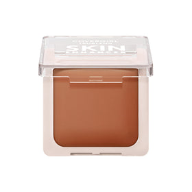 COVERGIRL open powder pan close-up showing baked surface and soft suede finish