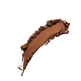 COVERGIRL powder puff and brush beside compact for easy touch-up application
