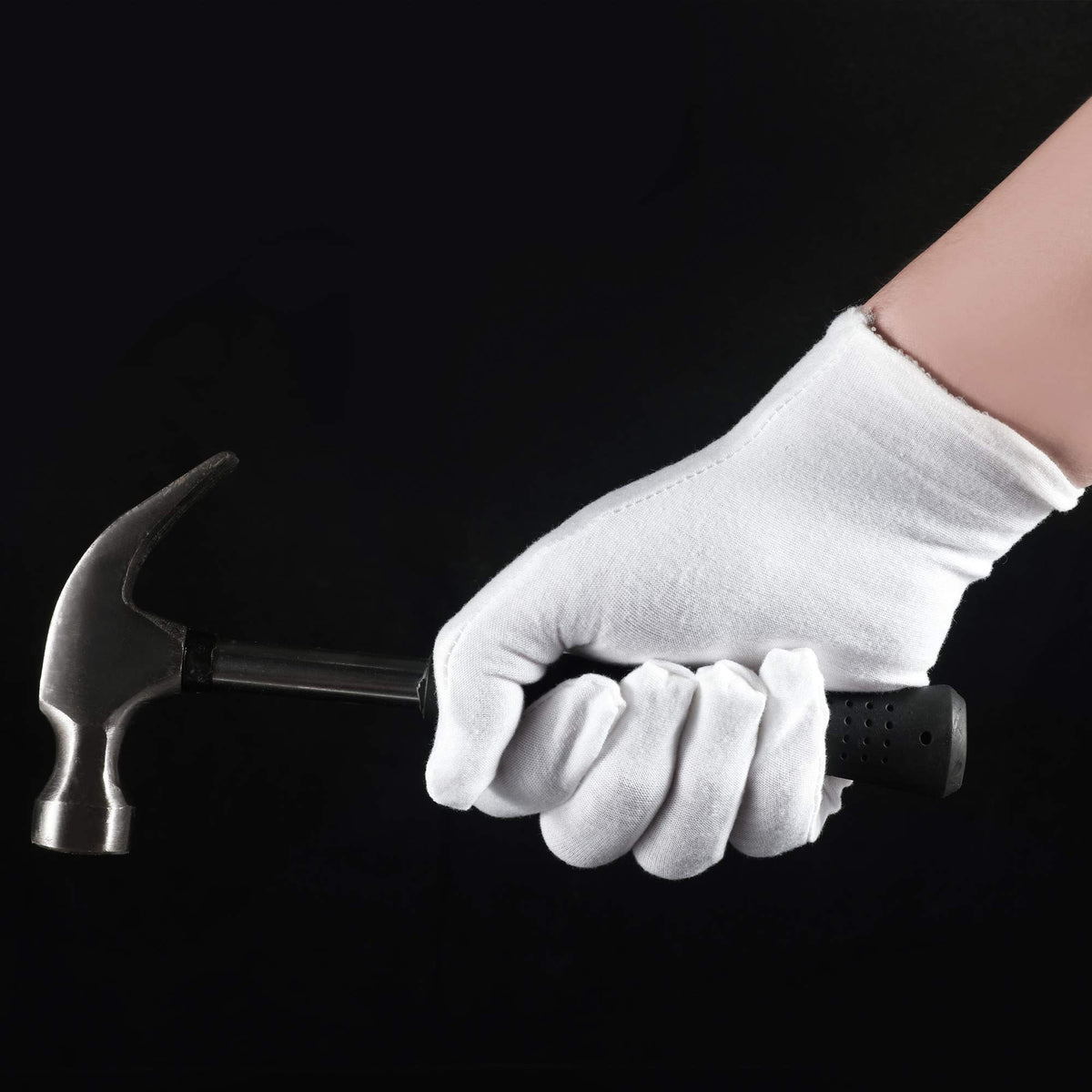 COYAHO gloves in use handling jewelry to prevent fingerprints and scratches