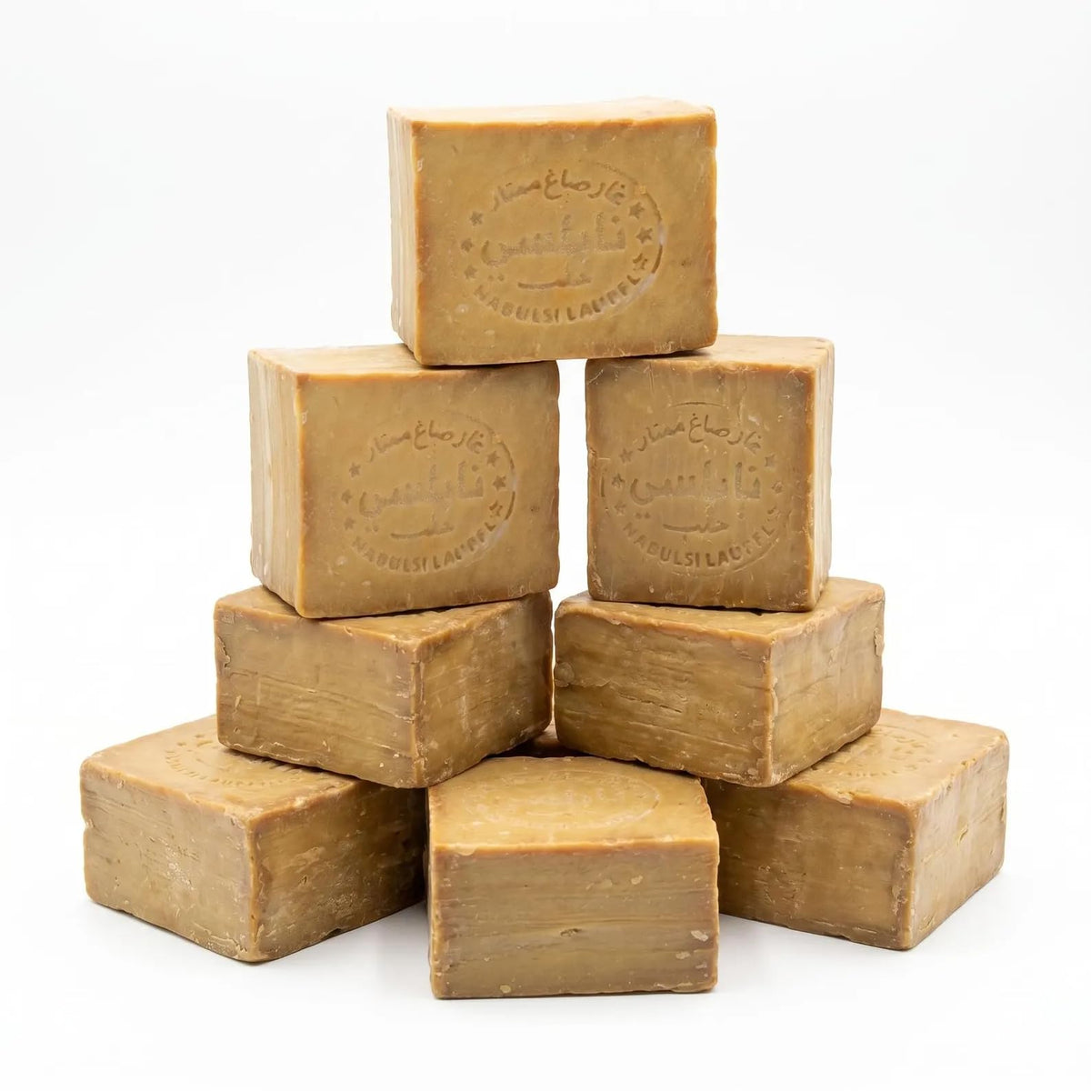 cozy soap texture close-up of olive-oil bar surface, highlights handcrafted quality