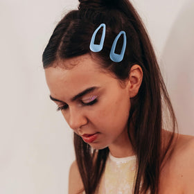 Cptots clips used in half-up hairstyle demonstrating secure no-slip grip