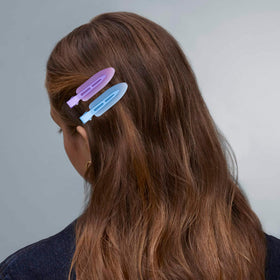 Cptots clip securing thick curly hair demonstrating strong gentle hold