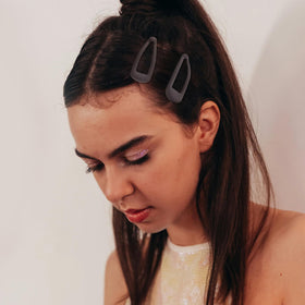 Cptots clip securing bangs in hair, discreet hold and tidy look
