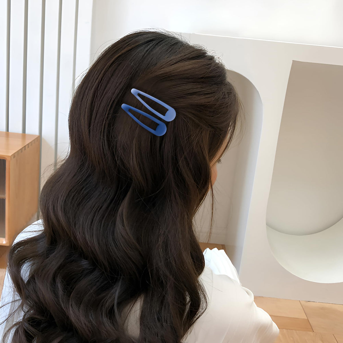 Cptots clip securing bangs offering discreet hold and polished look