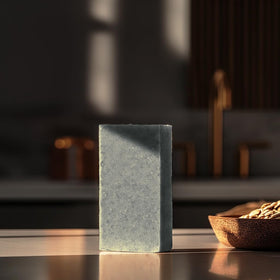 Crate 61 Organics unwrapped soap showing recycled kraft paperboard packaging and eco benefit