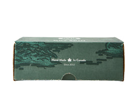 Bottles of olive, shea and avocado oils beside Crate 61 Organics bar showing natural ingredients