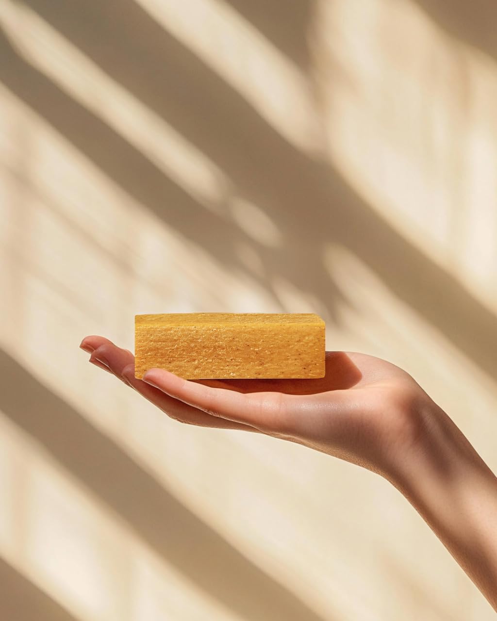 Crate 61 Organics mango lather in hand showing rich foam and gentle cleanse