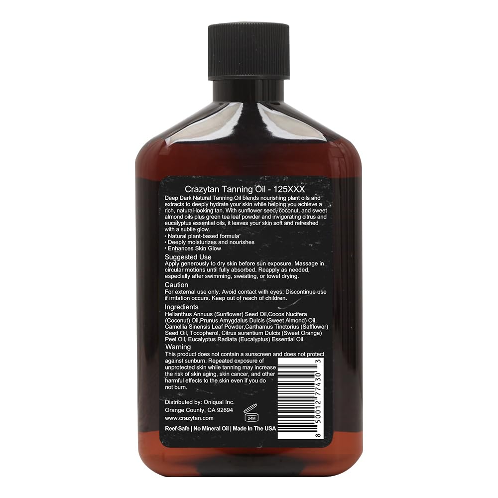 Crazytan bottle held in hand to show 8 oz scale and portable convenience
