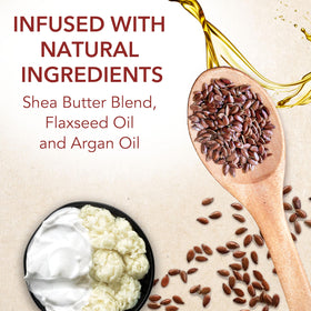 Creme of Nature being worked into wet textured hair demonstrating detangling benefit