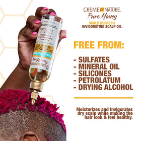 Creme of Nature oil texture pouring to show lightweight absorption