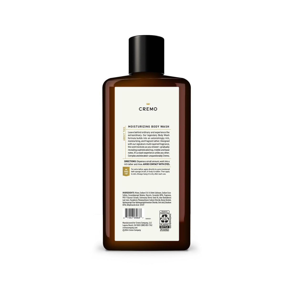 Cremo bottle on shower shelf in bathroom showing daily grooming use