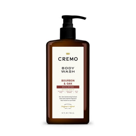 Cremo pump bottle front view showing bourbon & oak scent and convenient dispenser