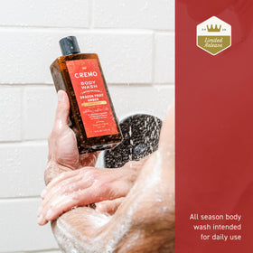 Cremo bottle on a shower shelf demonstrating everyday use and durable packaging benefit