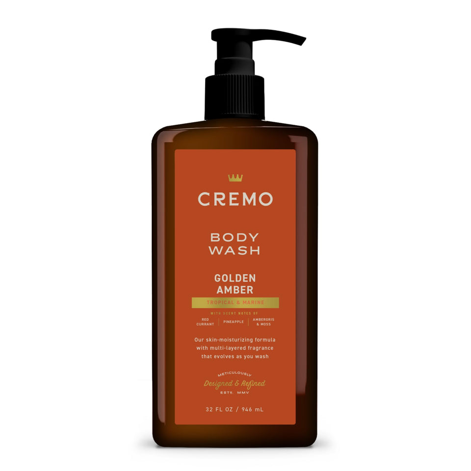 Cremo bottle front view showing golden amber label and luxurious large size