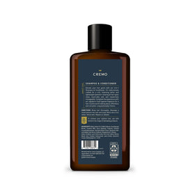 Cremo 16 fl oz bottle beside common items for scale to show travel-friendly, long-lasting supply