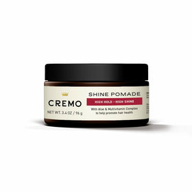 Cremo 3.4 oz jar next to ruler showing travel-friendly size benefit