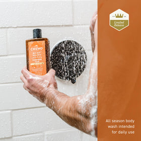 Cremo body wash on loofah producing fragrant lather for efficient cleansing