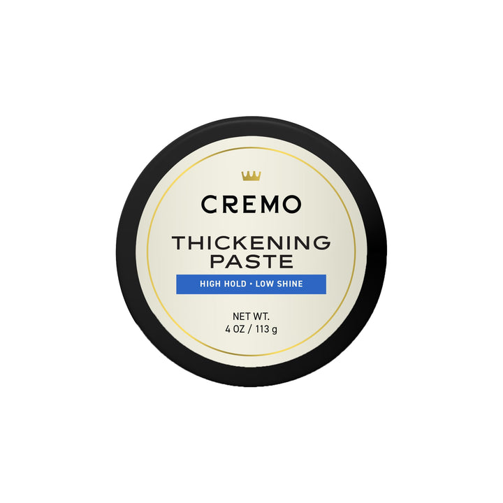 Cremo jar front view showing label and 4 oz size, highlights professional barber quality