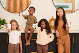 Cristina's Curls used on braided bun in lifestyle scene for polished, child-friendly look
