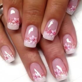 CTTHNBD close-up of floral French-tip detail highlighting durable acrylic finish