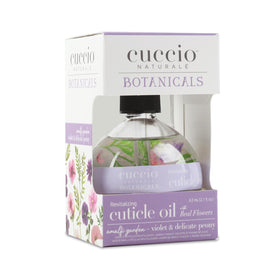 Hand applying Cuccio cuticle oil demonstrating quick absorption and smoother cuticles