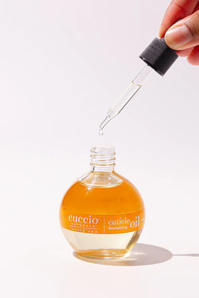 Cuccio ingredients still life with cold‑pressed oils showcasing plant‑based nourishment