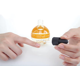 Cuccio bottle beside manicure tools promoting salon‑quality at‑home nail care