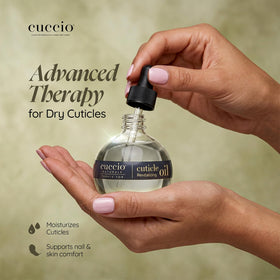 Cuccio bottle close-up with dropper dispensing oil, showing precise application benefit