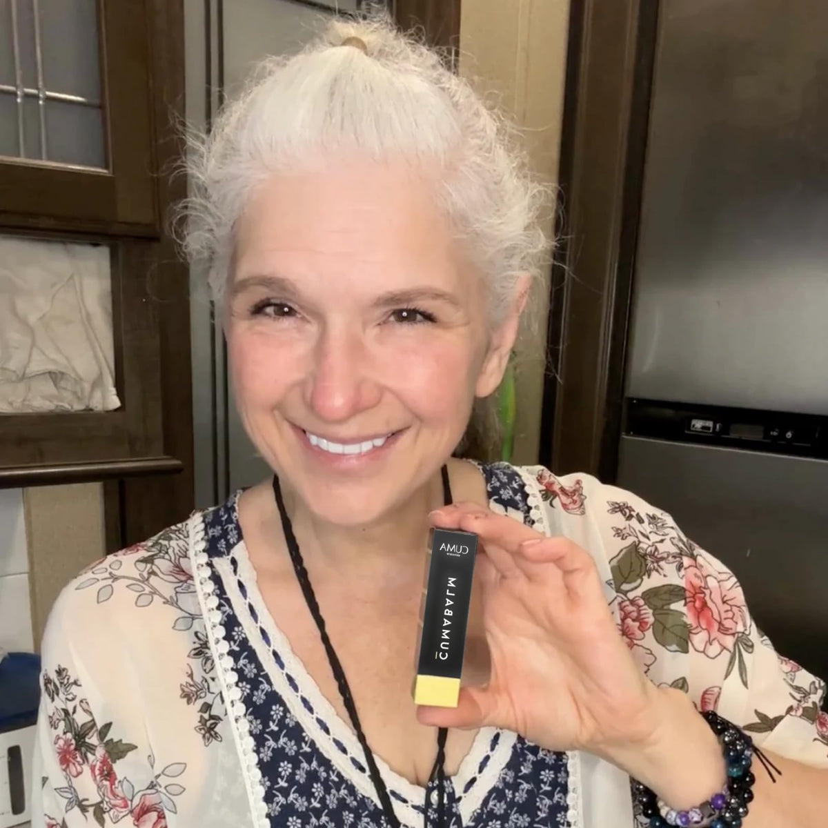 CUMA CumaBalm on bathroom vanity with mirror, suggests everyday skincare routine benefit