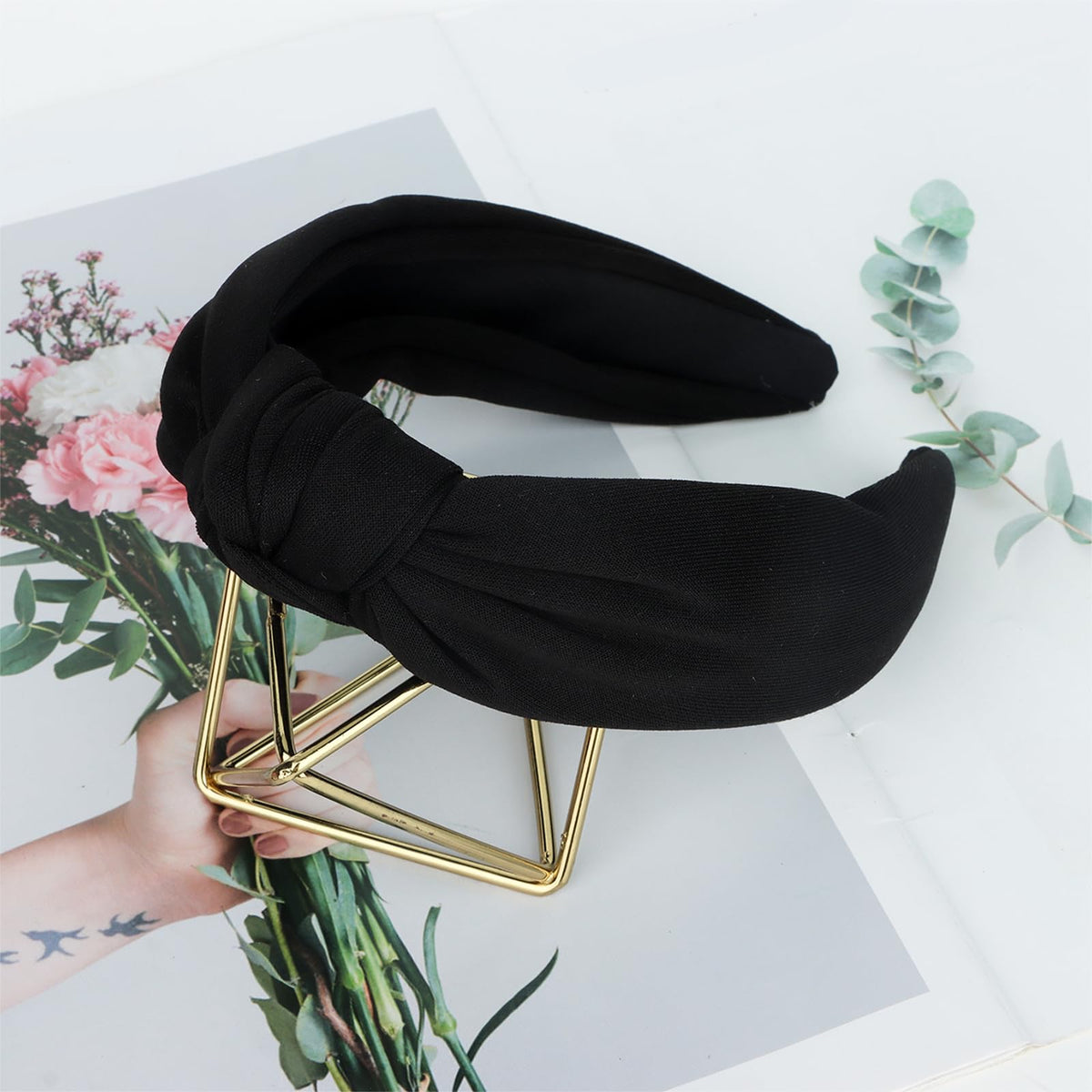 CURASA lifestyle image with headband styled in casual outfit for versatility