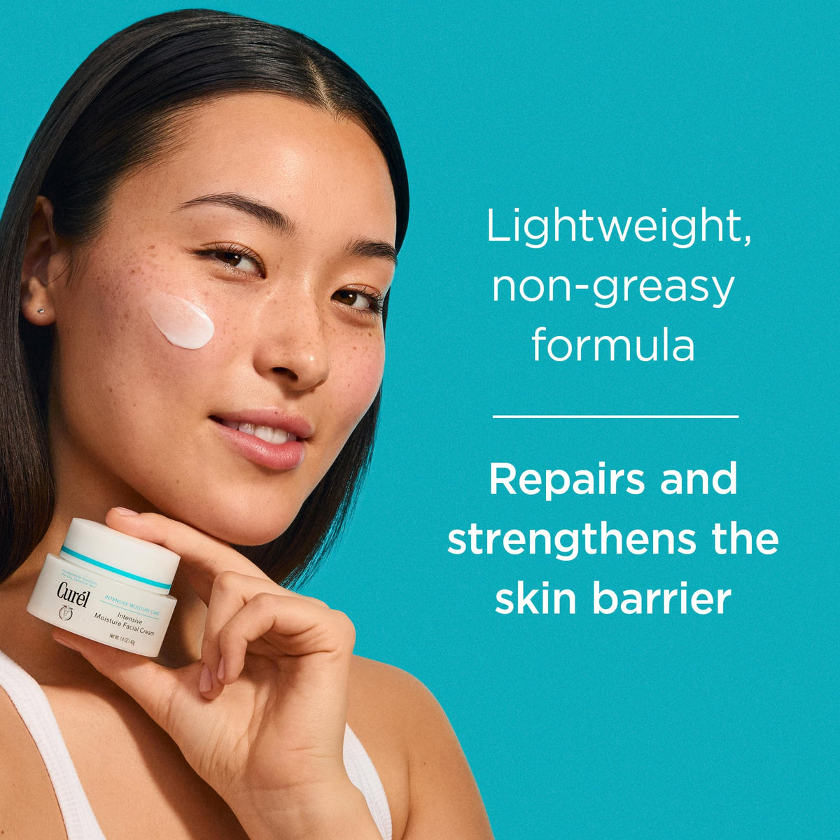 Curel cream on fingers ready to apply, shows easy absorption benefit