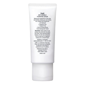Curel serum on a bathroom vanity conveying gentle daily skincare ritual